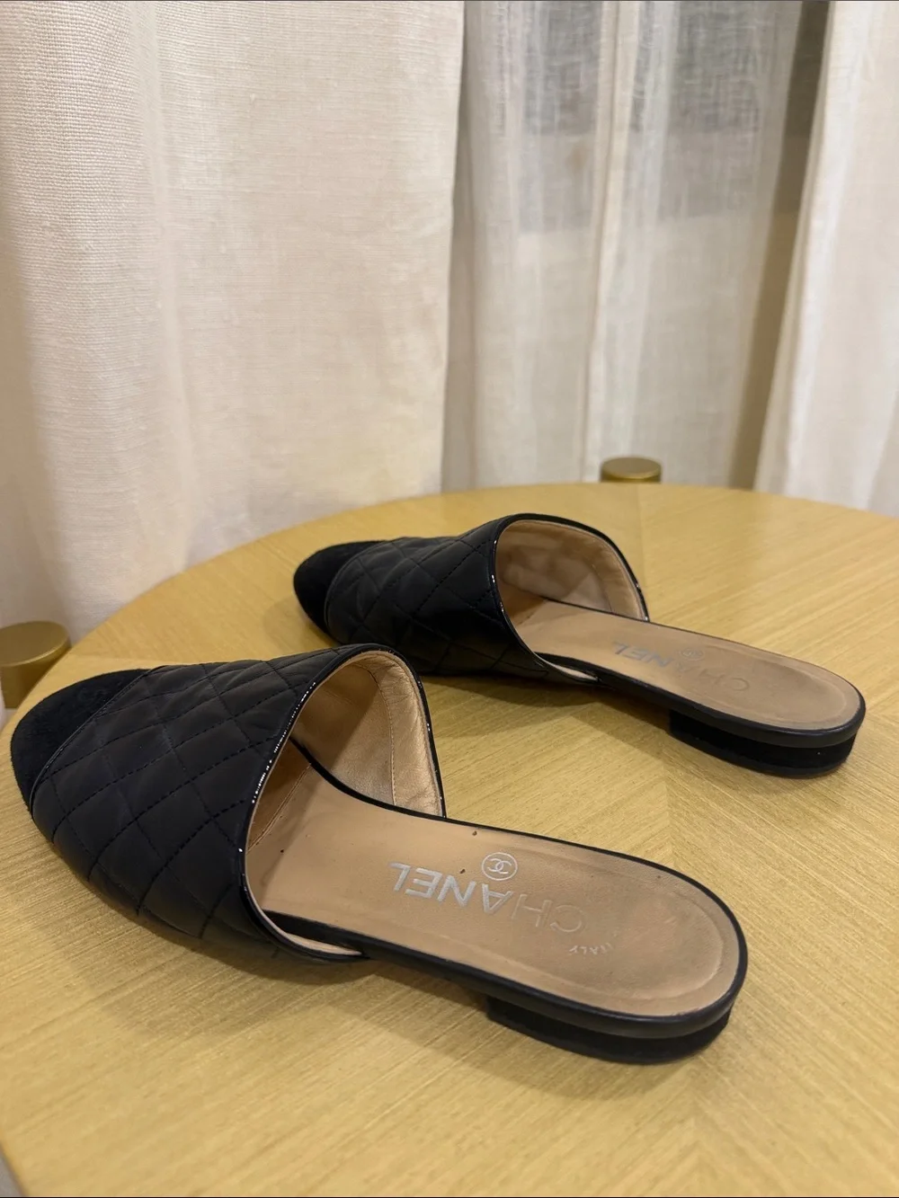 CHANEL Black Quilted Leather Slide Mules